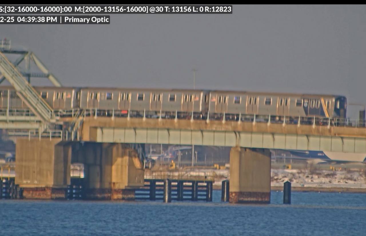 Long-lens surveillance sample still from field operations